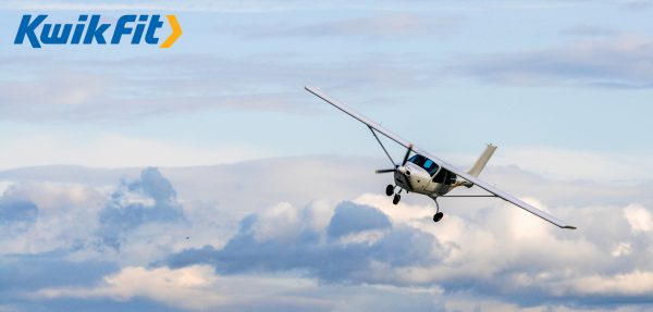 Plane flying to illustrate Kwik Fit internal incentive trips | Element - The Prize & Incentive People